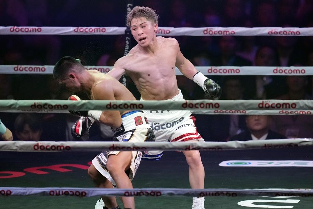 日本拳王井上尚彌包辦兩級別的拳王金腰帶。(美聯社)