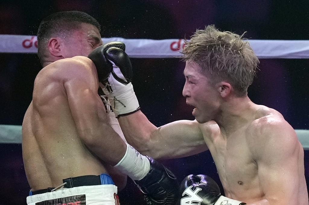 日本拳王井上尚彌包辦兩級別的拳王金腰帶。(美聯社)