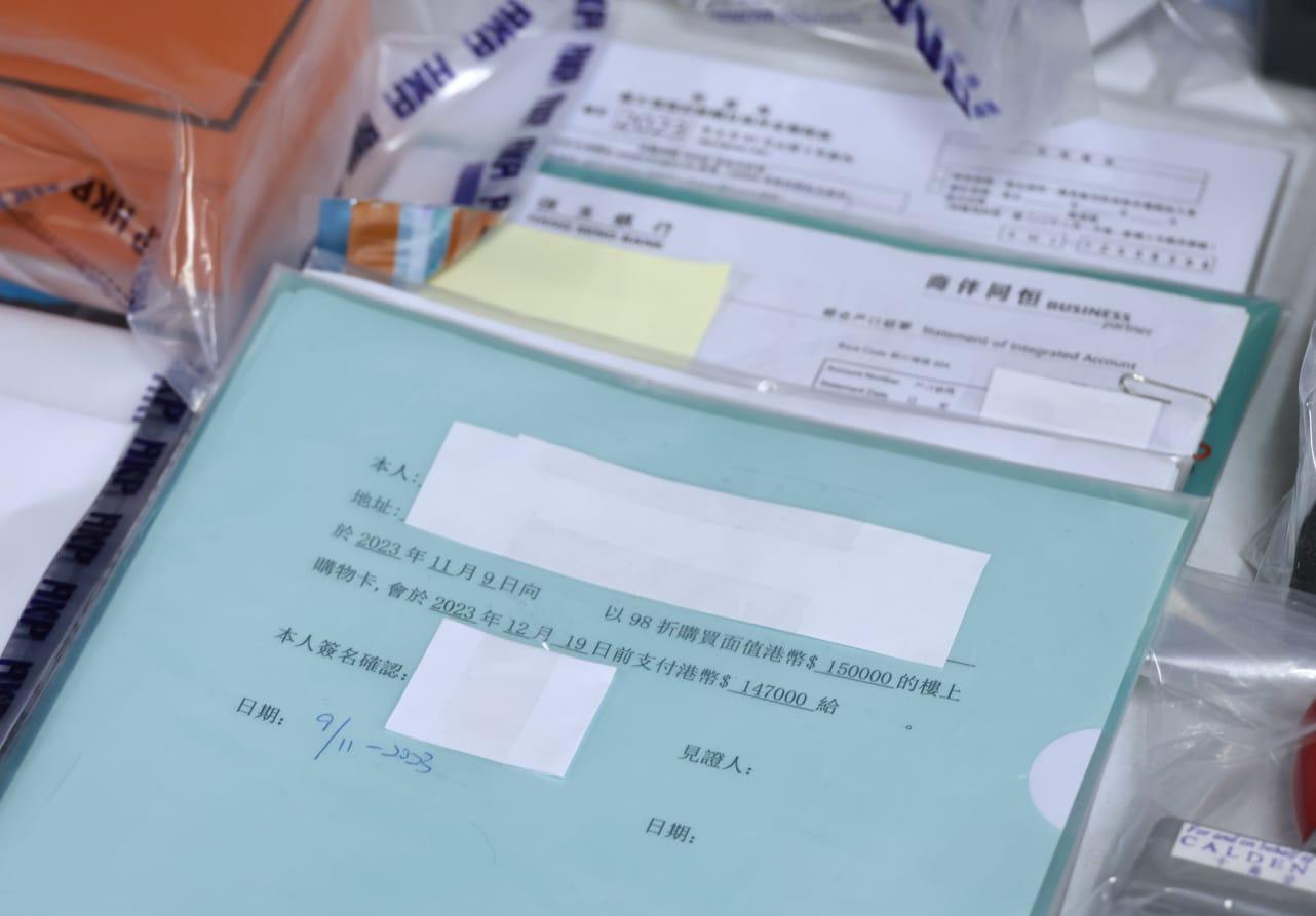 冒充銀行電話提供低息貸款騙逾百萬元 警方拘一男七女 (林俊源攝)