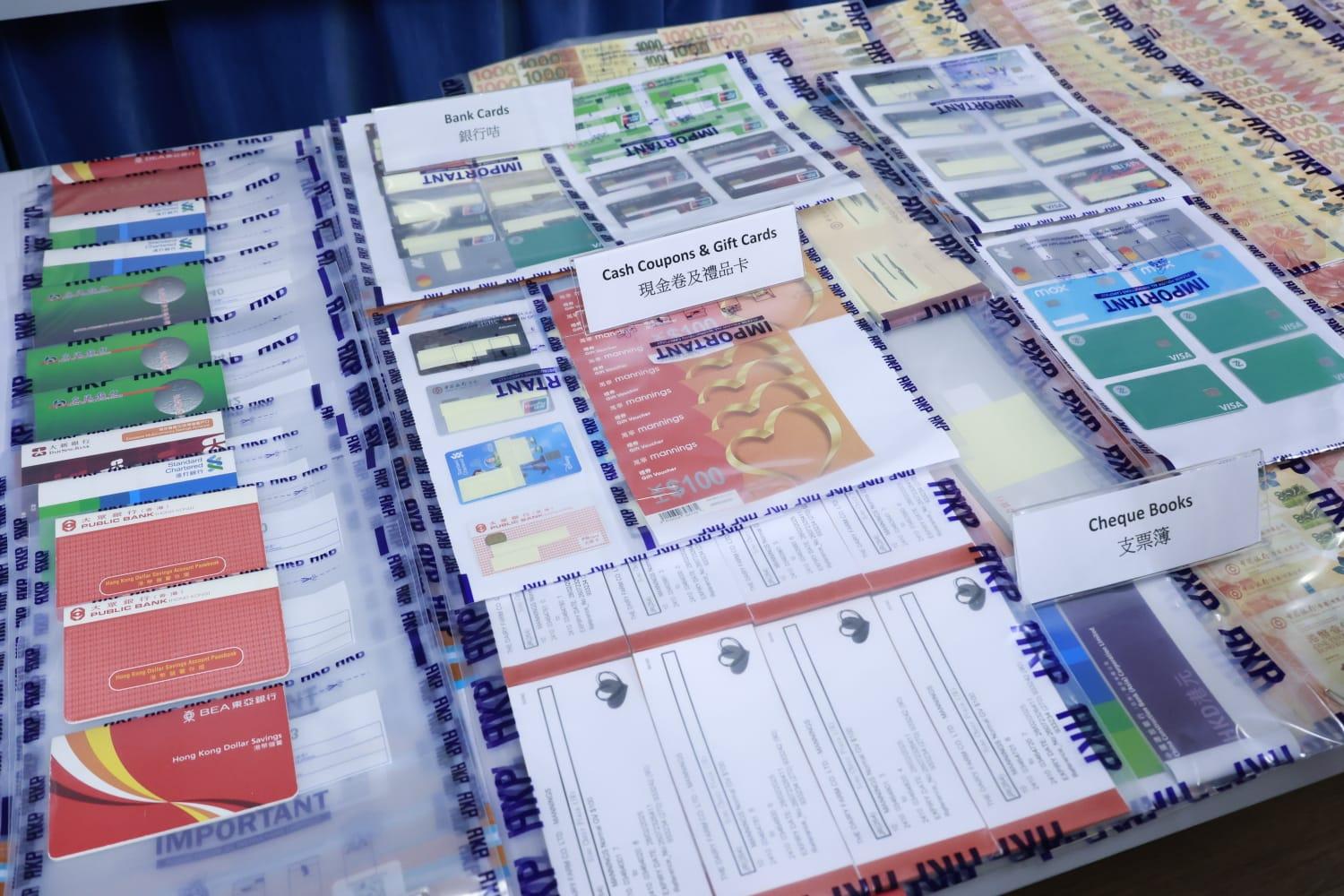 冒充銀行電話提供低息貸款騙逾百萬元 警方拘一男七女 (林俊源攝)