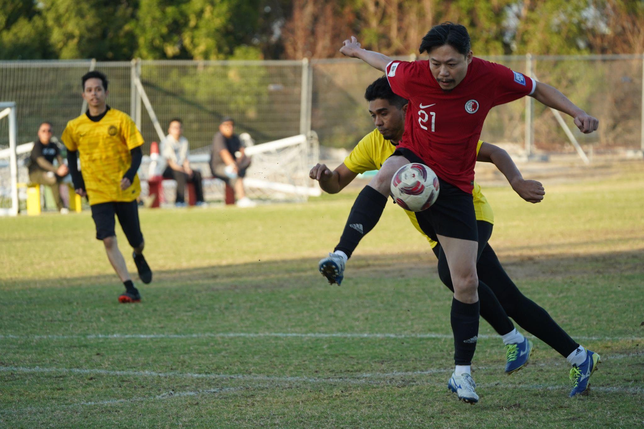 香港球迷在卡塔爾與馬來西亞球迷友賽。(球迷Edmund提供)