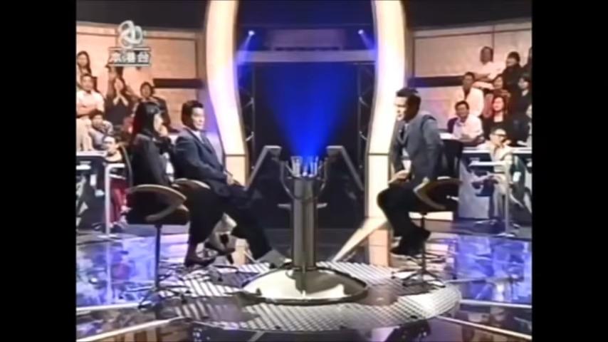 百萬富翁由陳啟泰主持,是亞視經典節目,當中陳芷菁及鄧光榮「拍定手先」成為經典Meme圖(影片截圖)