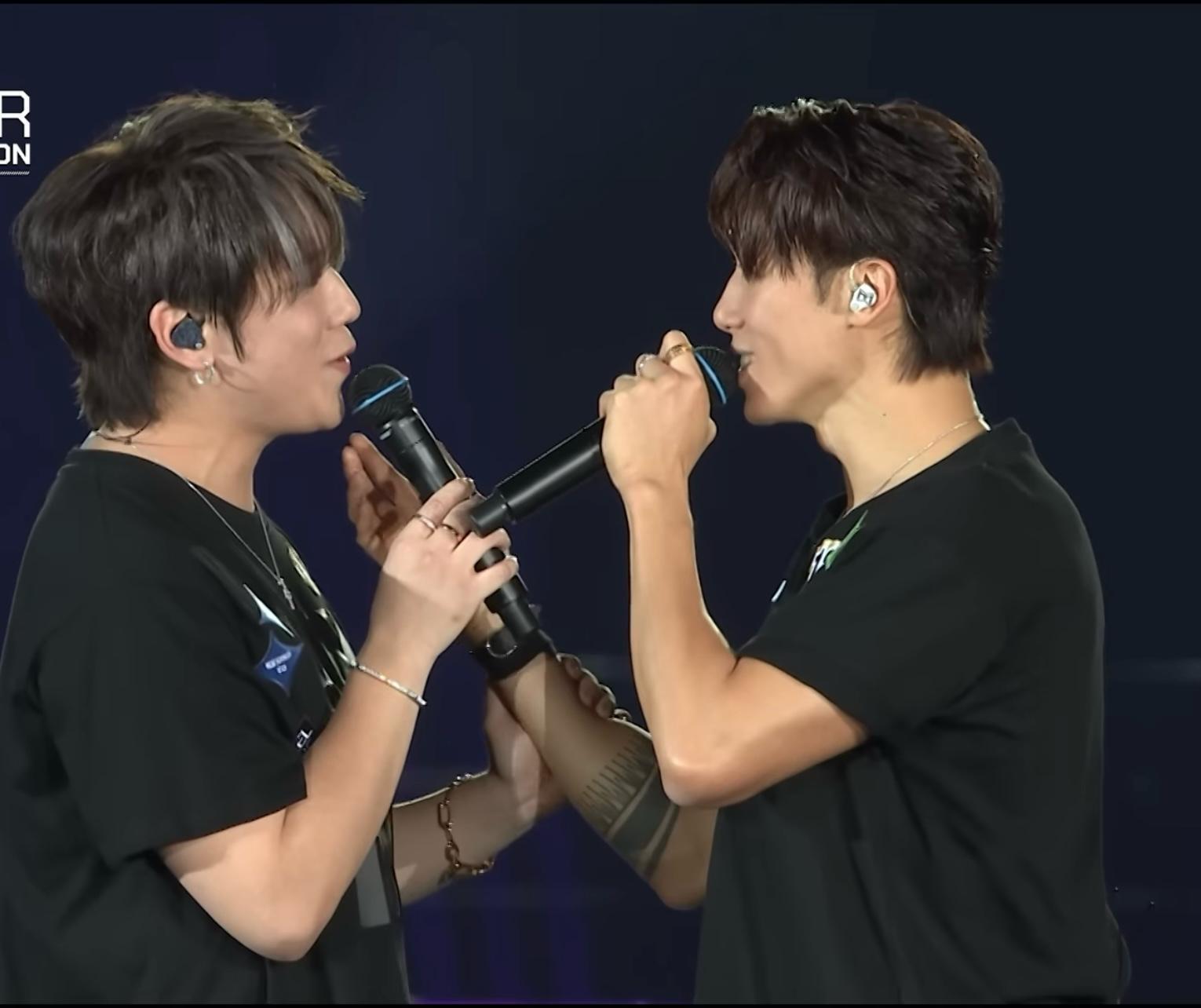 Stanley與姜濤合唱《蒙著嘴說愛你》,不時「哥弟」深情對望。