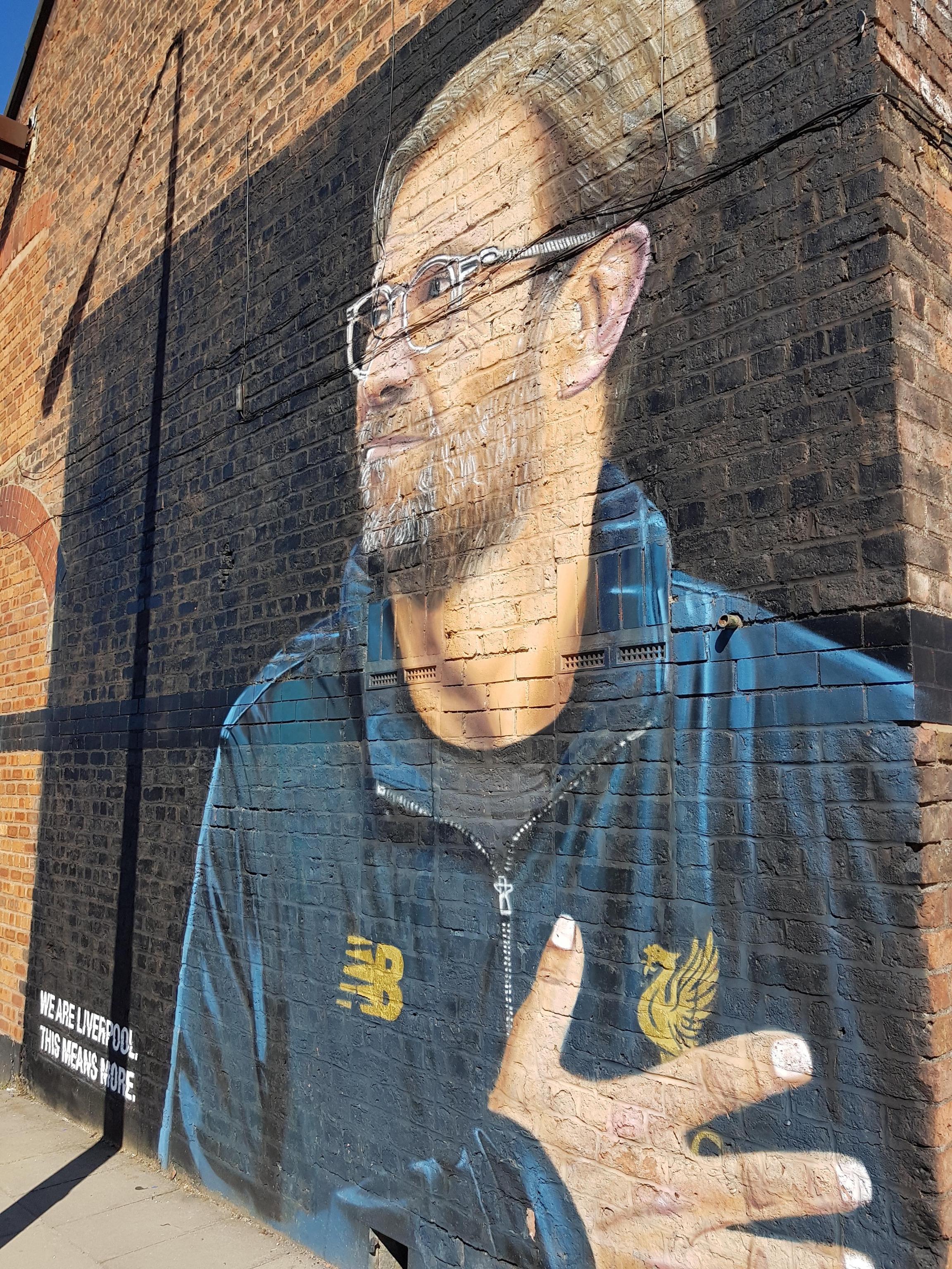 季尾將離開利物浦的主帥高普壁畫。