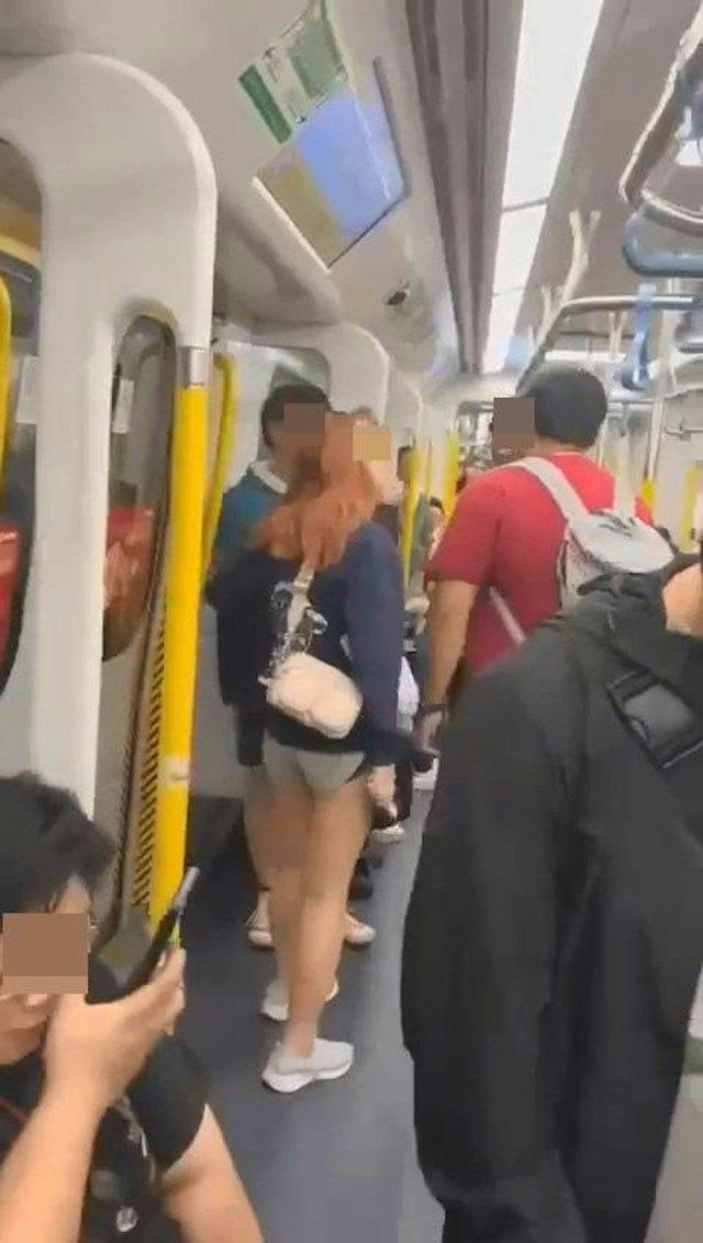 網上熱話|短褲女港鐵「M痛」踎地惹目光 斥學生哥視姦:你知唔知性騷擾嘅定義係咩?(網片截圖)