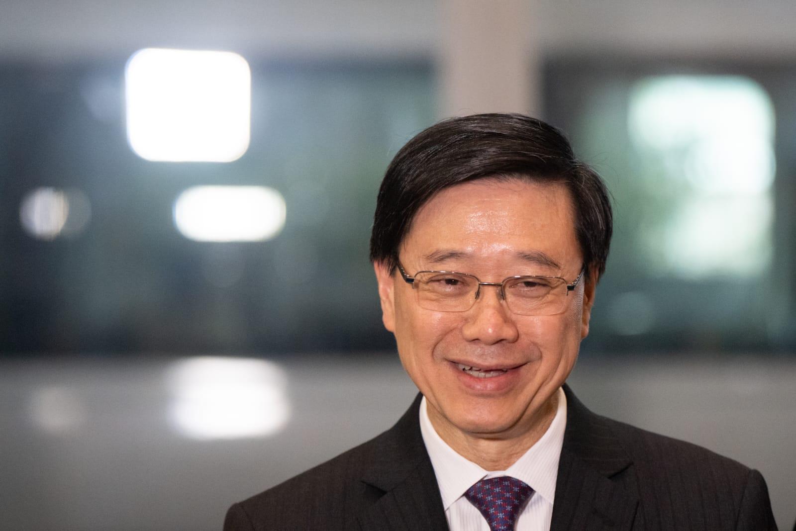 李家超在會後見傳媒,指中央重視香港國際城市地位,及對對香港光明前景充滿信心。(林靄怡攝)