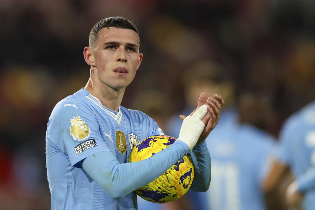 英超曼城以3︰1反勝賓福特,科頓連中三元粉碎進步不大的都市傳說。(美聯社)