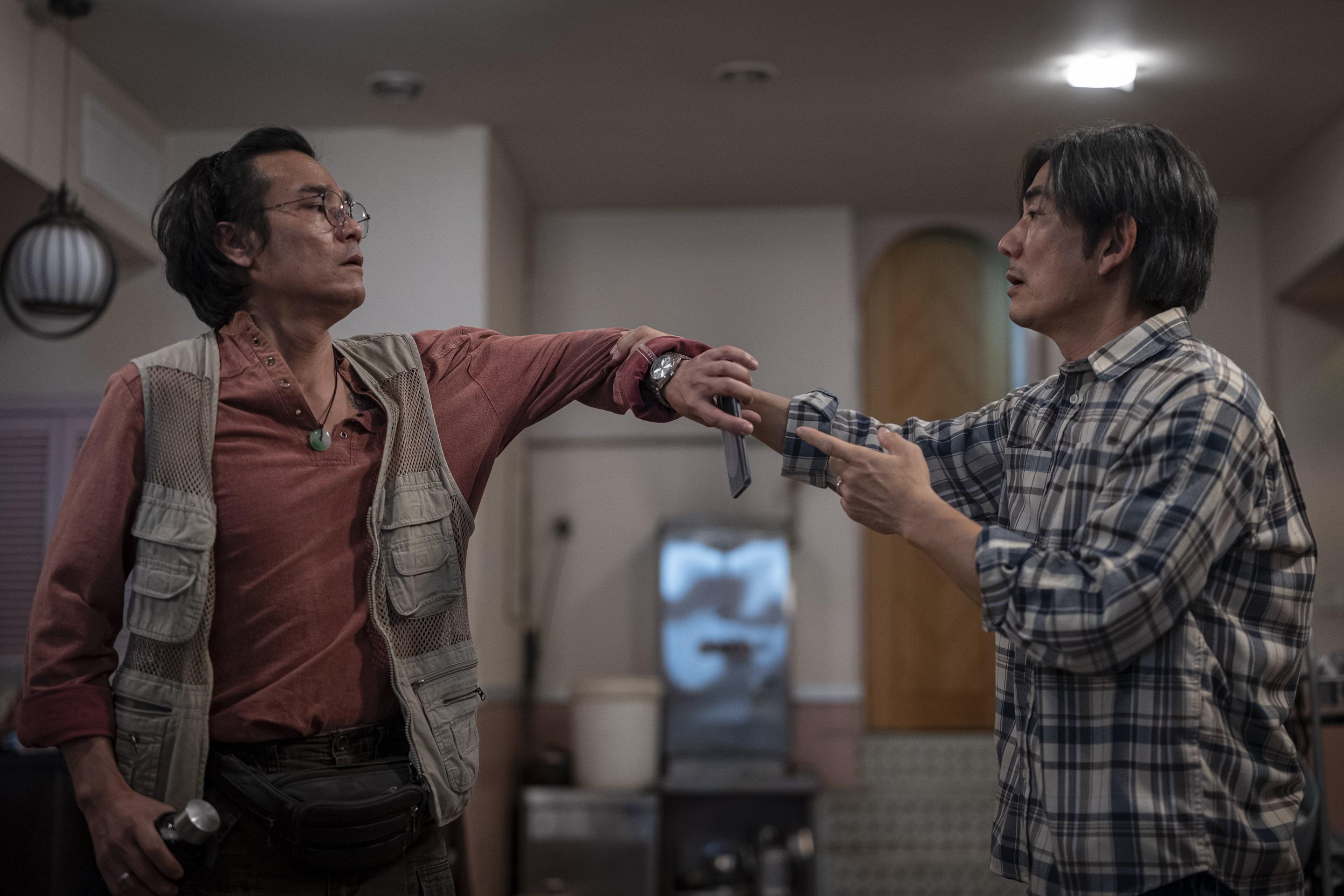 林家棟、任賢齊。(《臨時劫案》劇照)