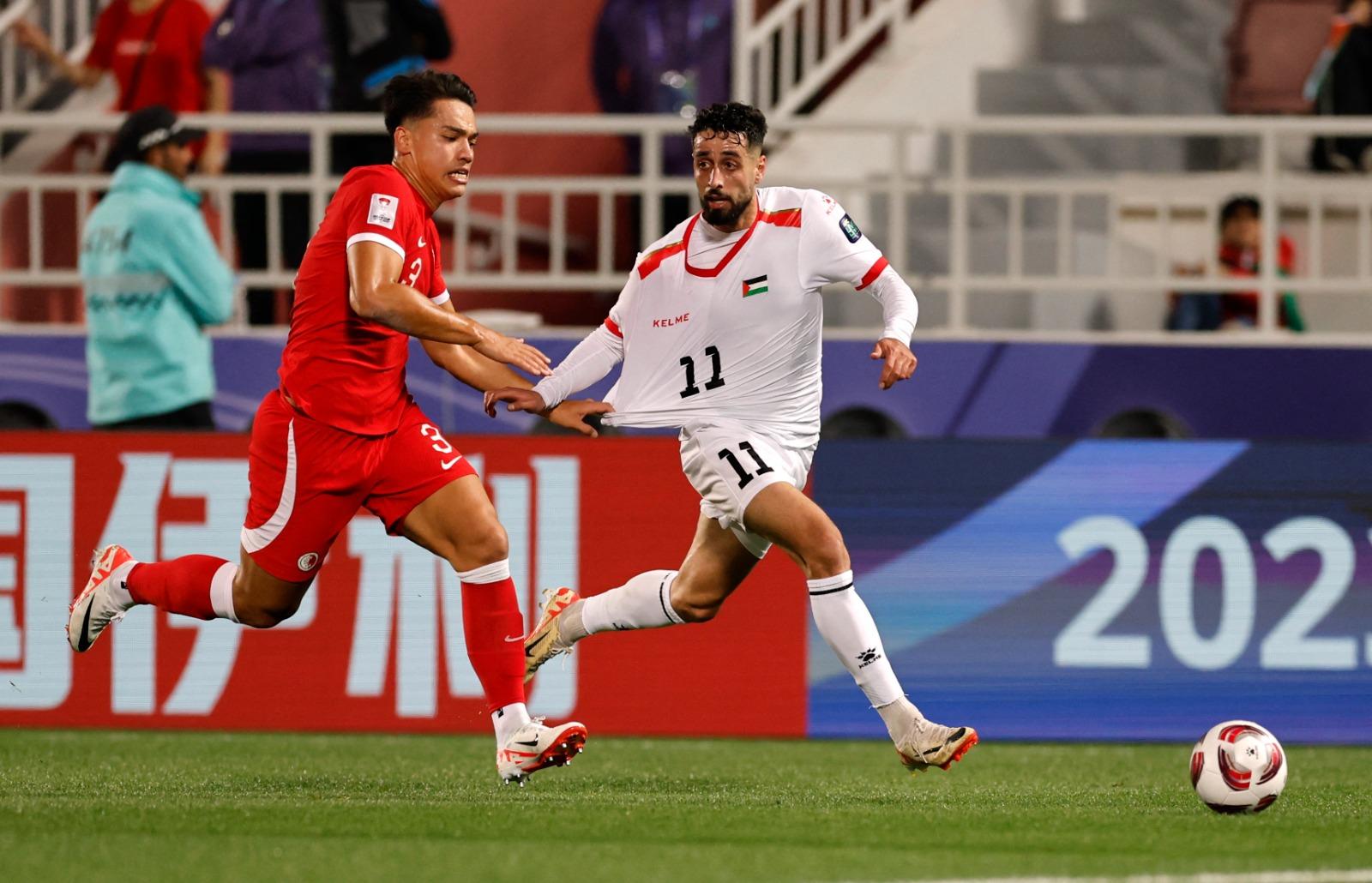 亞洲盃分組賽,香港足球隊Vs巴勒斯坦,左為周緣德 。(路透社)