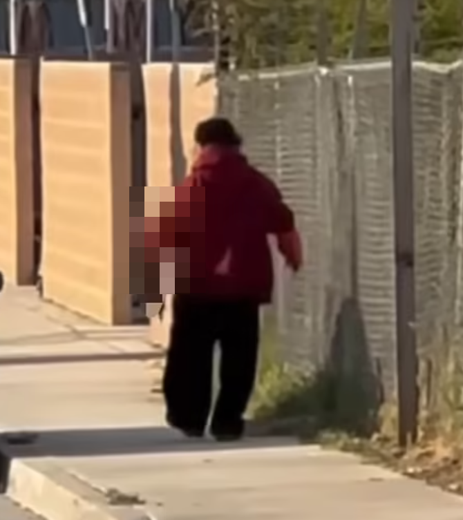 涉事27歲男子特萊茲(Resendo Tellez)懷疑從事故現場拾走殘肢,並當街啃食。(影片截圖)