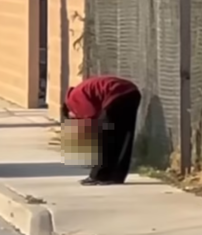 涉事27歲男子特萊茲(Resendo Tellez)懷疑從事故現場拾走殘肢,並當街啃食。(影片截圖)