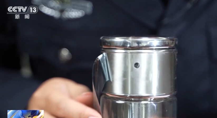 偷拍水杯甚至有自毀功能 (央視截圖)