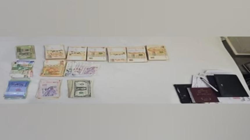 經搜查後檢獲多種面額和國家的貨幣,總值約78,662新加坡元。(新加坡警察部圖片)