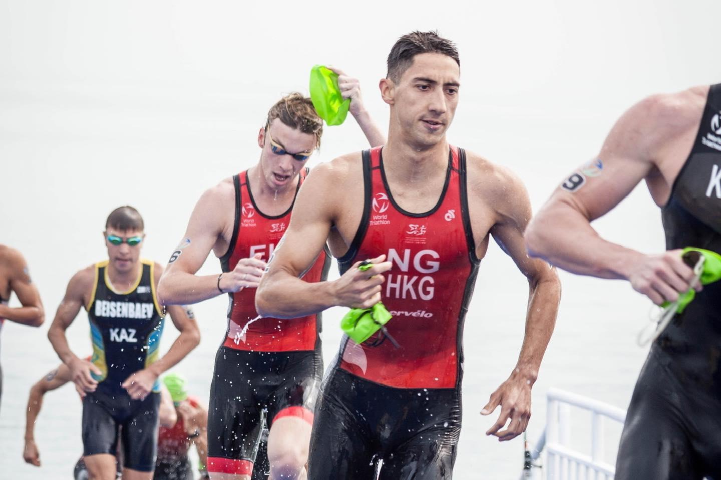 伍泰龍在杭州亞運三項鐵人混合接力賽中獲得銅牌(伍泰龍fb)