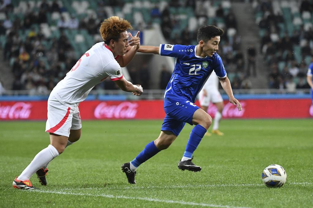 香港隊作客0:3不敵烏茲別克。(美聯社)