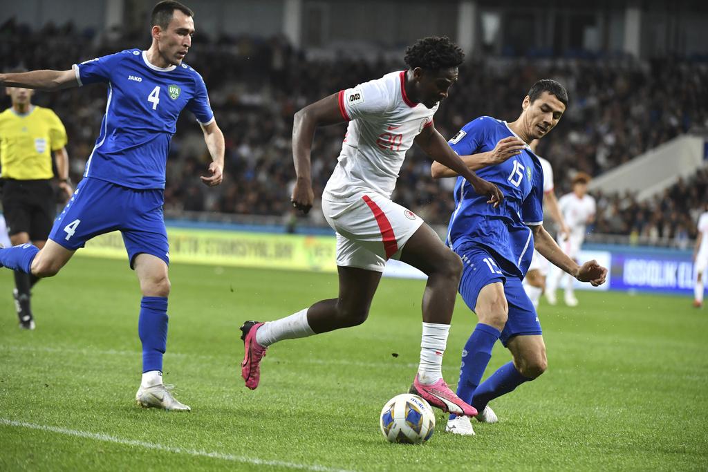 香港隊作客0:3不敵烏茲別克。(美聯社)