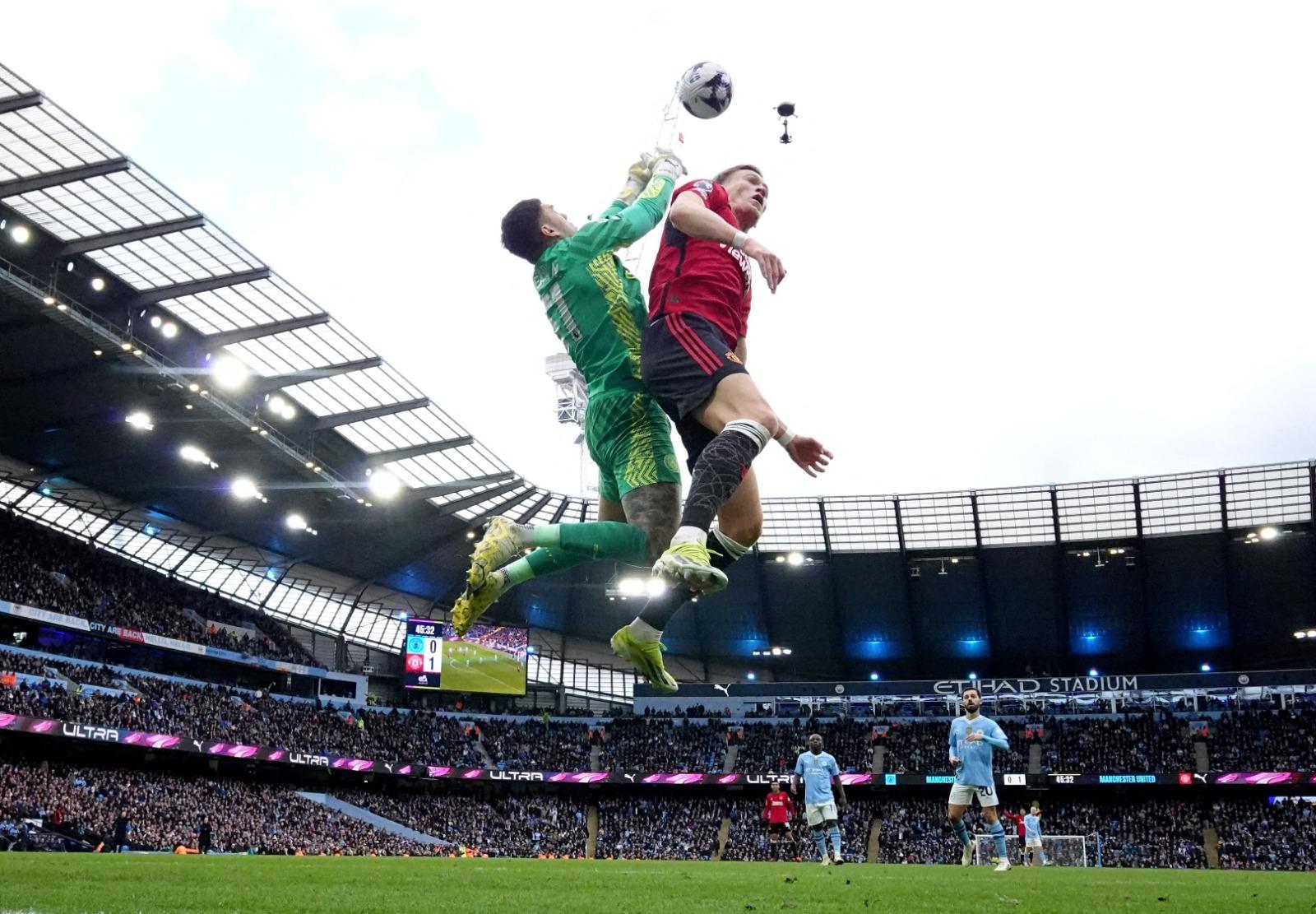 英超|曼城反勝曼聯,追近利物浦。(路透社)