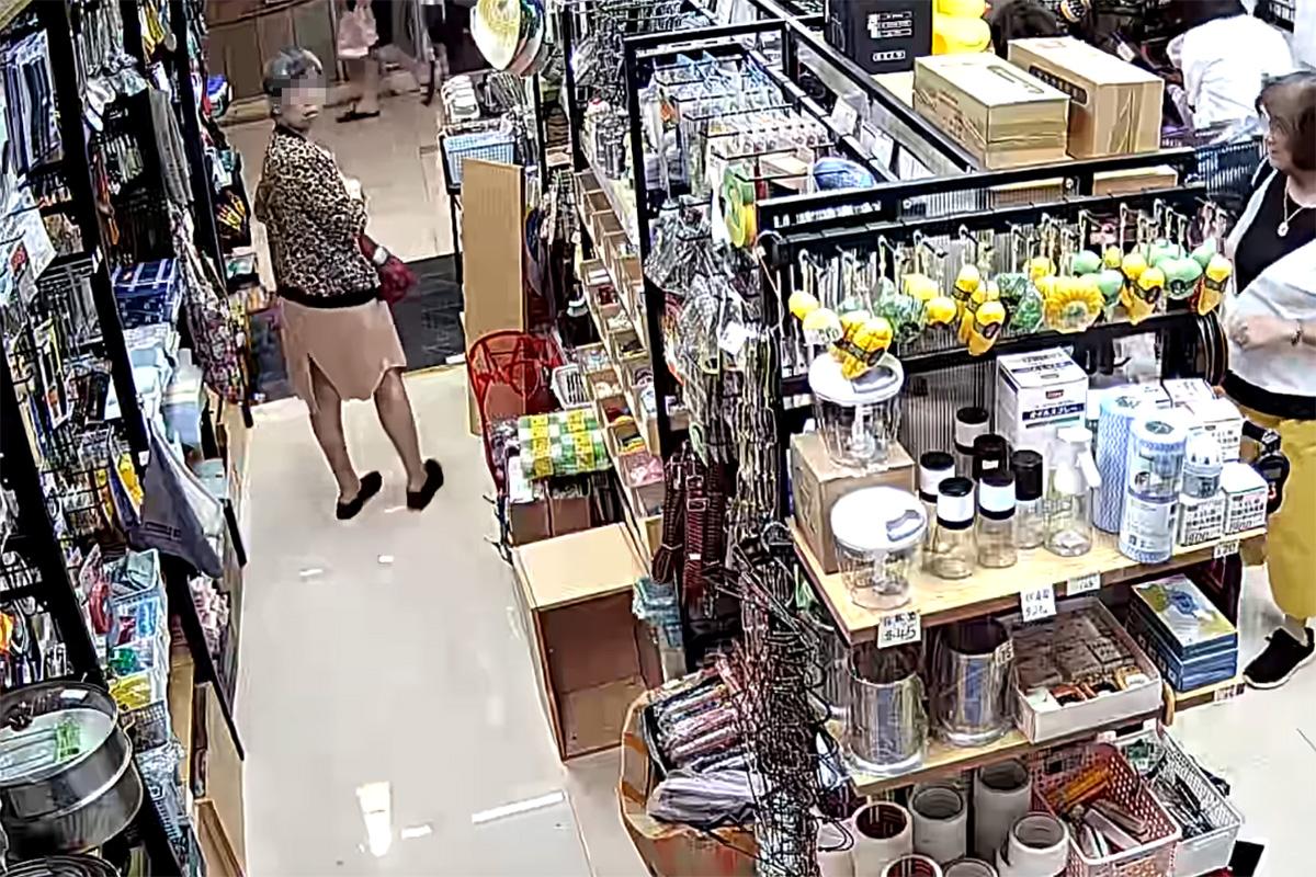 將軍澳一間家品店被一名女子盜取環保袋,全程被店內閉路電視拍下。(網上影片截圖)