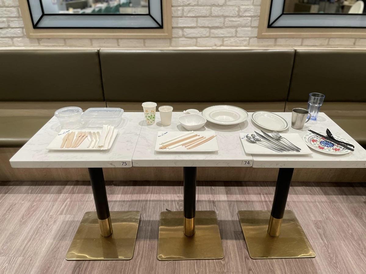 謝展寰今日到食肆和零售店了解「走塑」首日運作情況。(環境及生態局FB)