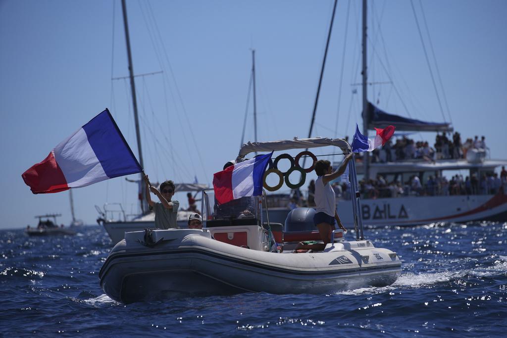 法國南部城市馬賽上周奧運聖火傳遞活動期間。(美聯社)