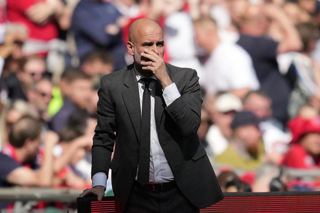 英格蘭足總盃|哥迪奧拿不滿曼城球員表現。(美聯社)