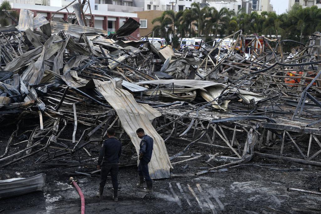 印度古吉拉特邦兒童遊樂場火災現場。(美聯社)