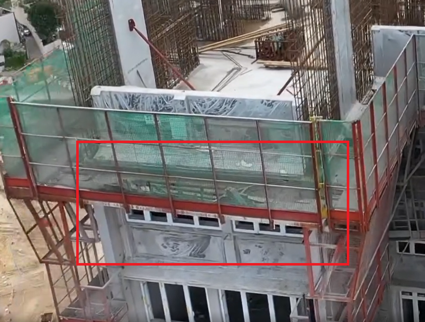 有航拍片段顯示朗天苑C座24樓有單位外牆窗戶排列,與其他樓層同座向單位相反。(朗天苑資訊站影片截圖)