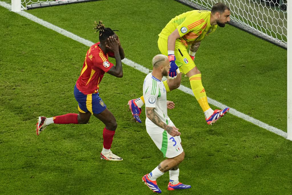 西班牙上半場錄得9次射門,惜未能攻破意大利門將基安盧基當拿隆馬的十指關。(美聯社)