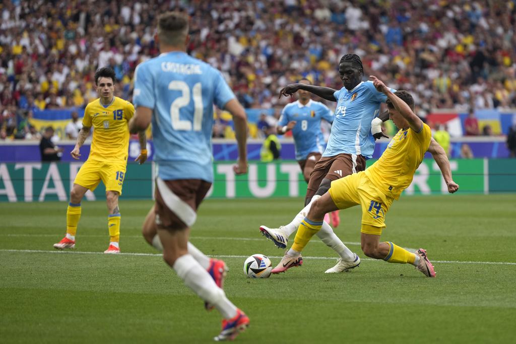 比利時與烏克蘭上半場互無入球,比數維持0:0。(美聯社)