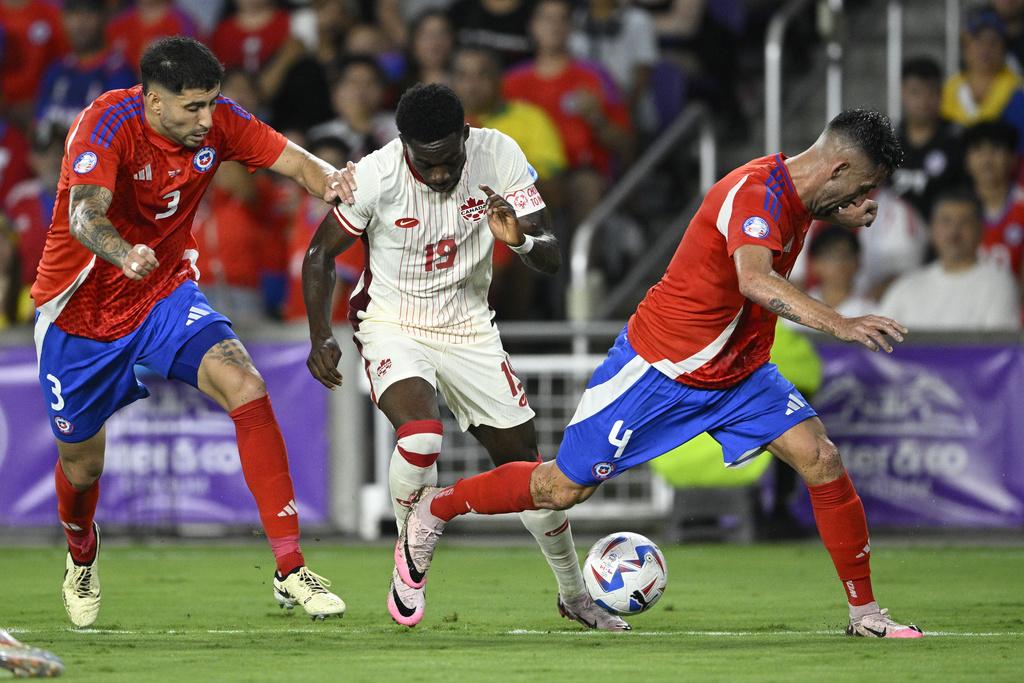 加拿大與智利踢平0:0。(美聯社)