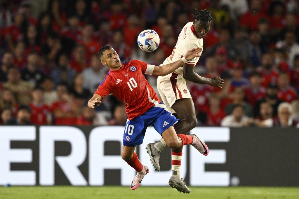 加拿大與智利踢平0:0。(美聯社)