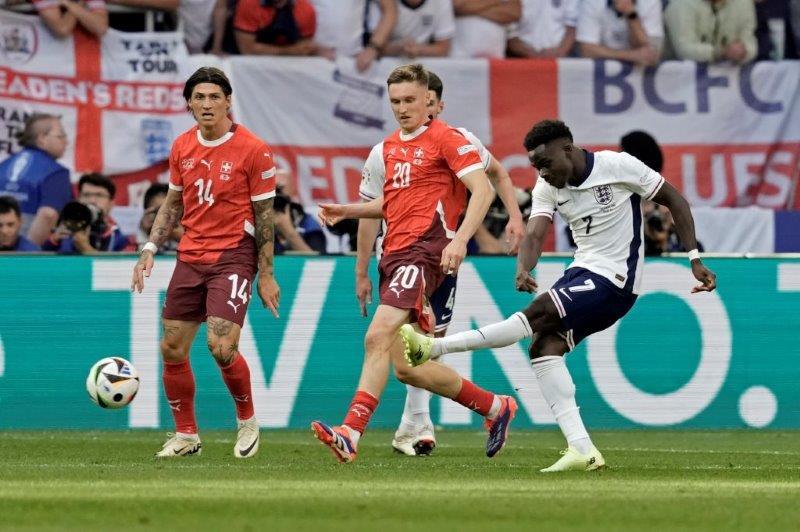 布卡約沙卡射入世界波扳平。(美聯社)