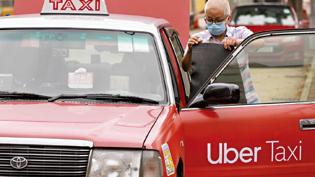 政府研究向網約車平台發牌。(資料圖片)