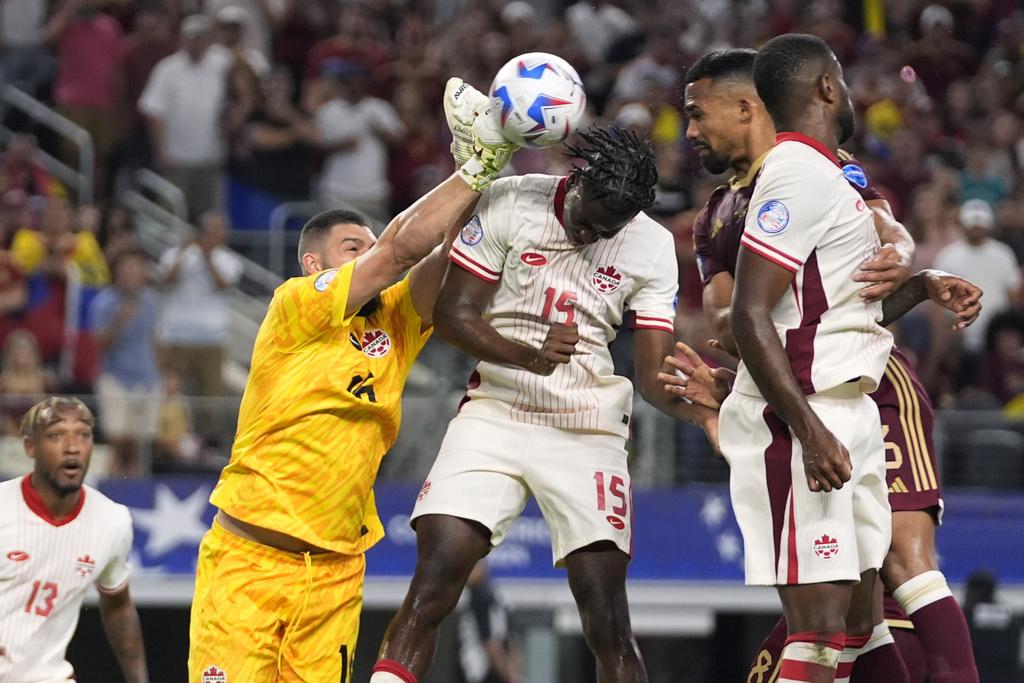 加拿大與委內瑞拉賽和1:1,12碼加拿大晉級。(美聯社)