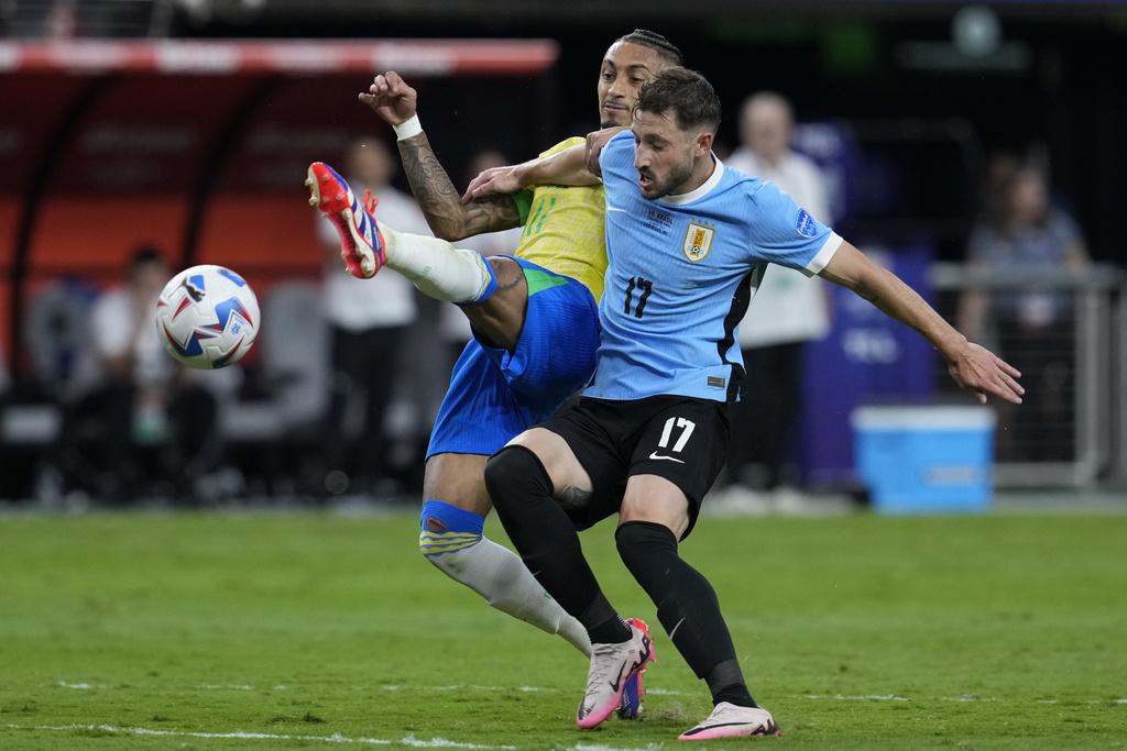 烏拉圭與巴西法定時間踢平0:0。(美聯社)