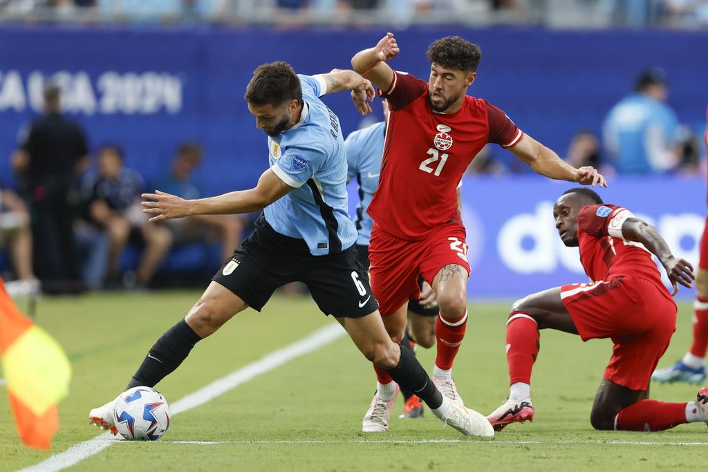 加拿大與烏拉圭2:2言和,烏拉圭互射12碼勝出。(美聯社)