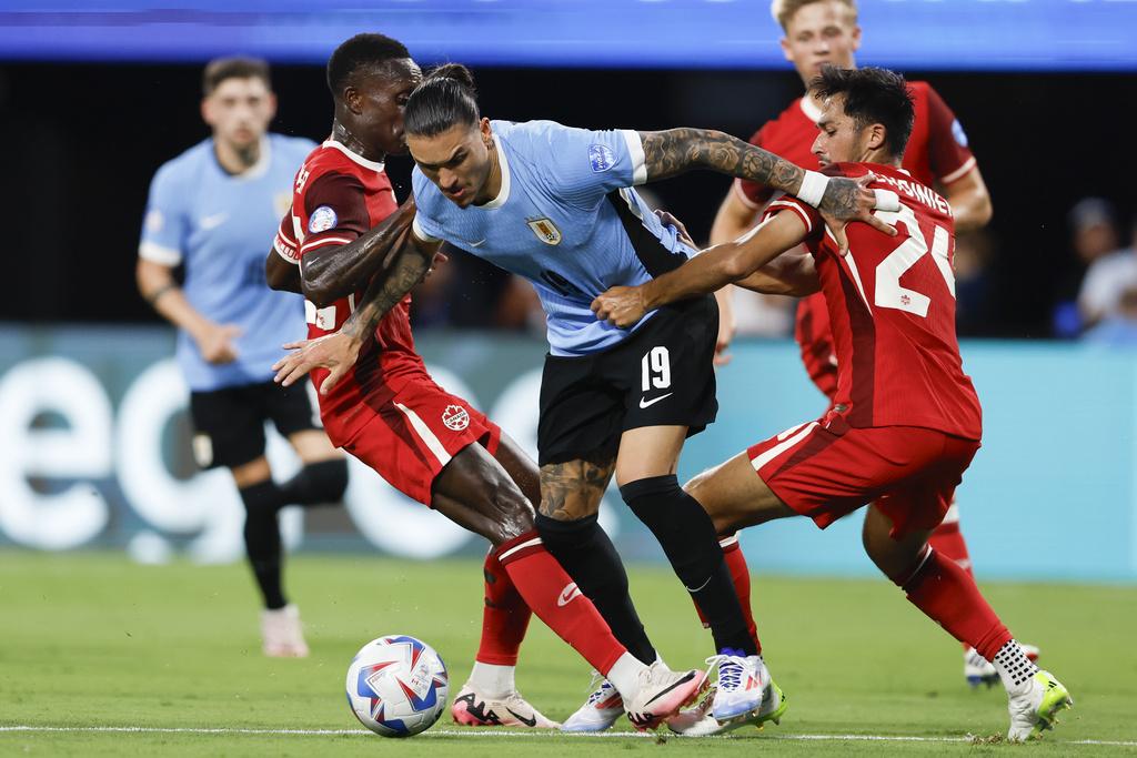 加拿大與烏拉圭2:2言和,烏拉圭互射12碼勝出。(美聯社)