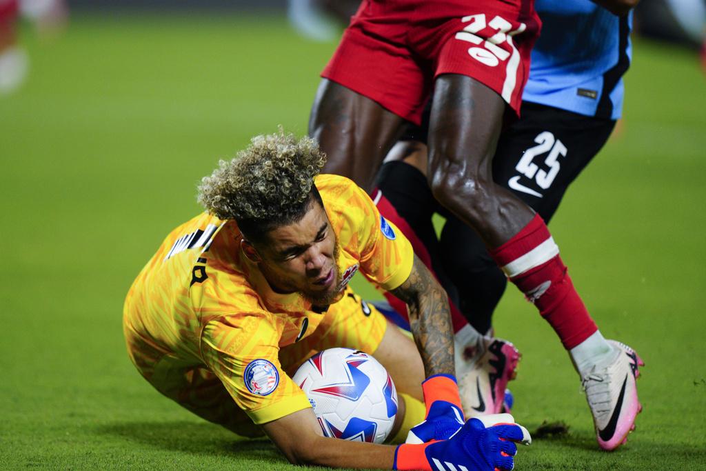 加拿大與烏拉圭2:2言和,烏拉圭互射12碼勝出。(美聯社)