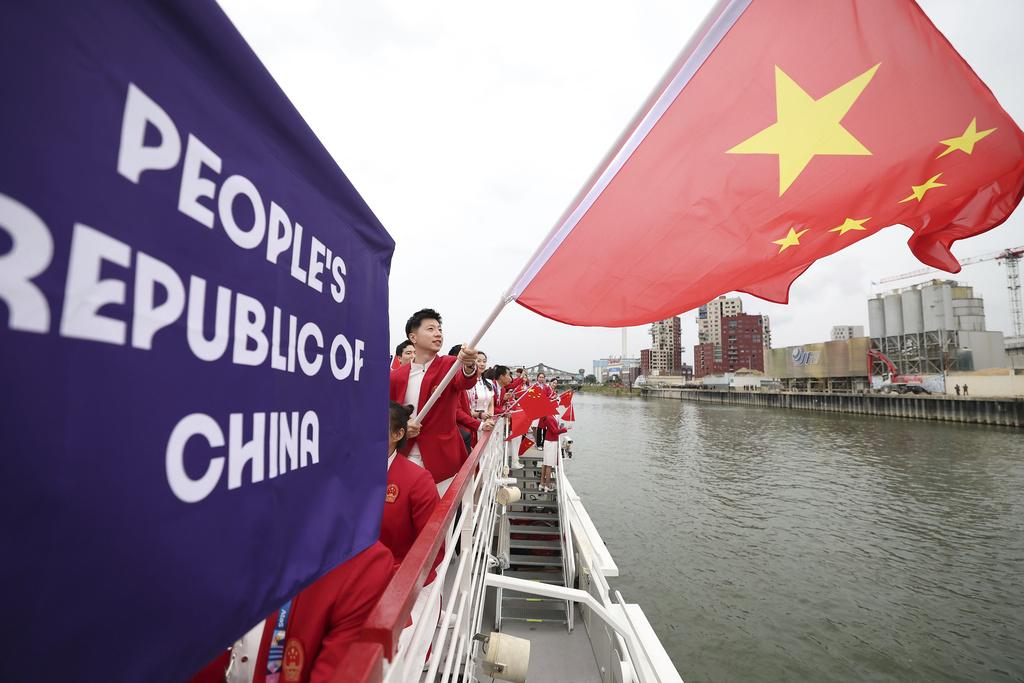 國家隊聲勢繼續浩瀚,於開幕禮與加拿大同船。(新華社)