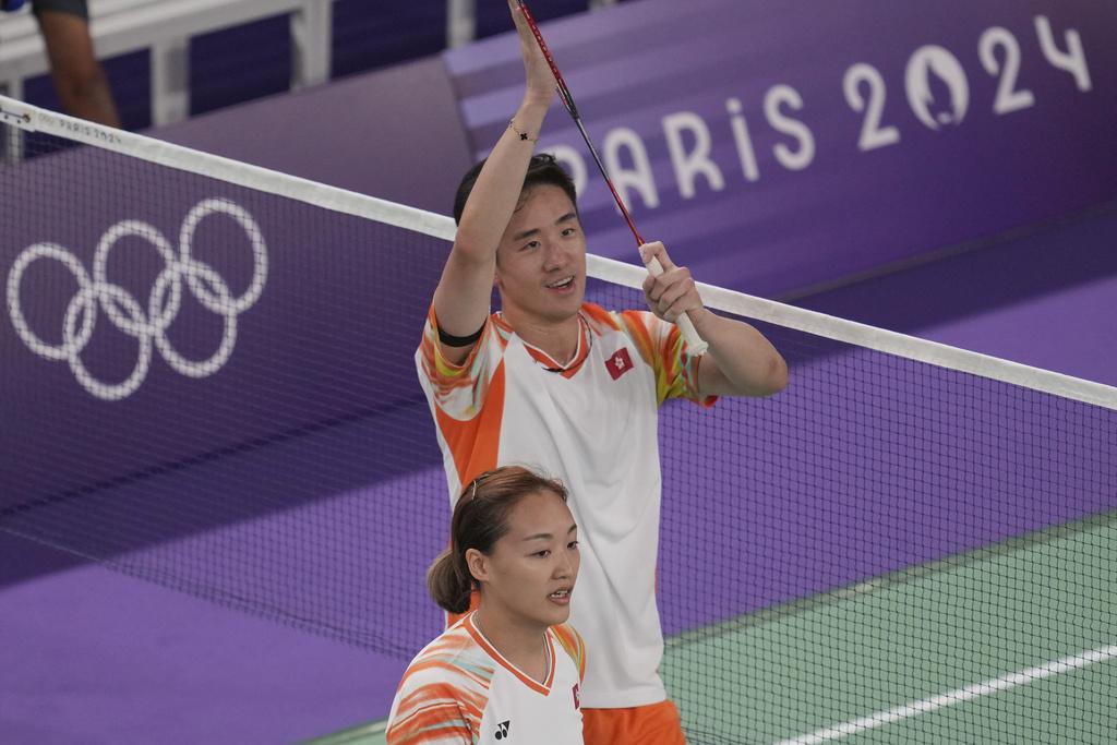 鄧俊文與謝影雪的組合首戰輕取中華台北對手。(美聯社)