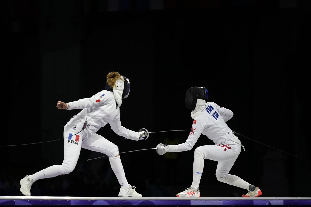 江旻憓純地反擊,感動奪金。(美聯社)