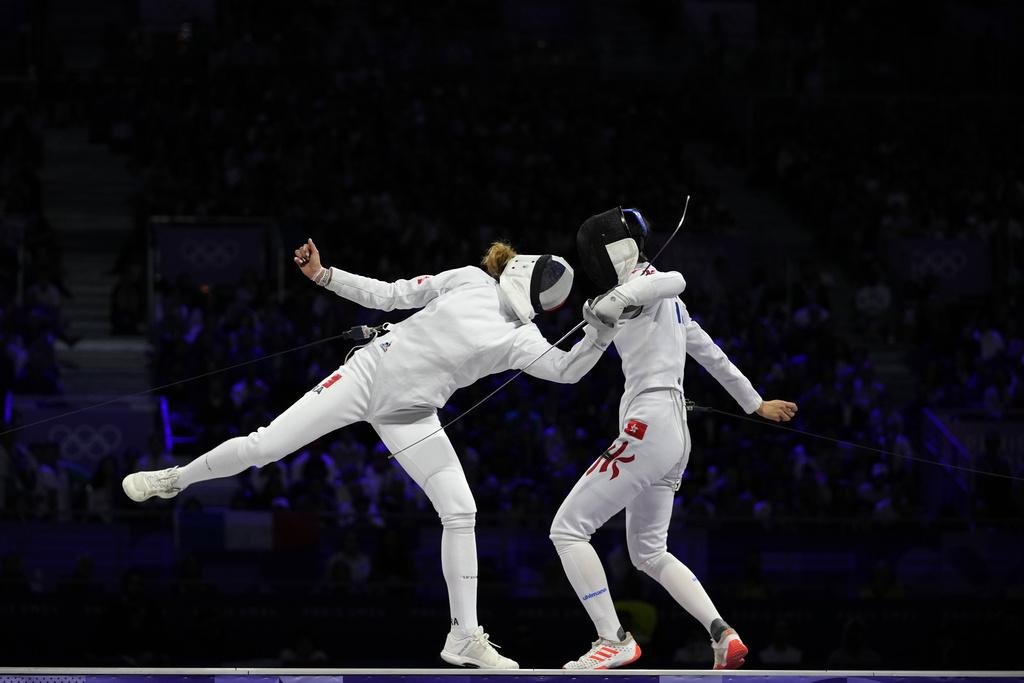 江旻憓純地反擊,感動奪金。(美聯社)