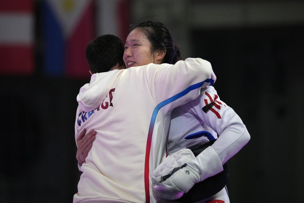 江旻憓純地反擊,感動奪金。(美聯社)