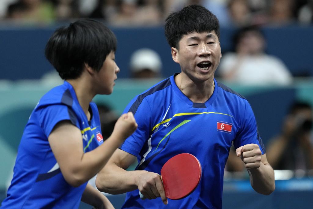 北韓組合李正植/金琴英合作無間。(美聯社)