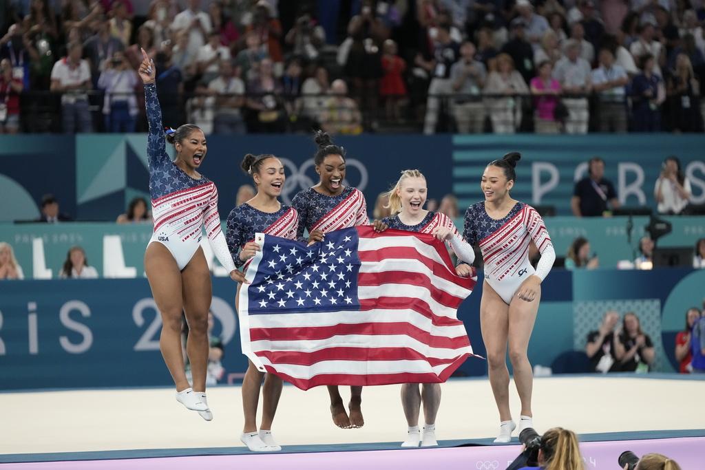 美國在女子體操團體賽奪冠。(美聯社)
