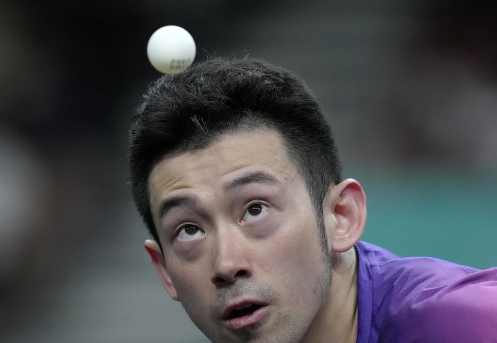 黃鎮廷在男單次圈被淘汰。(美聯社)