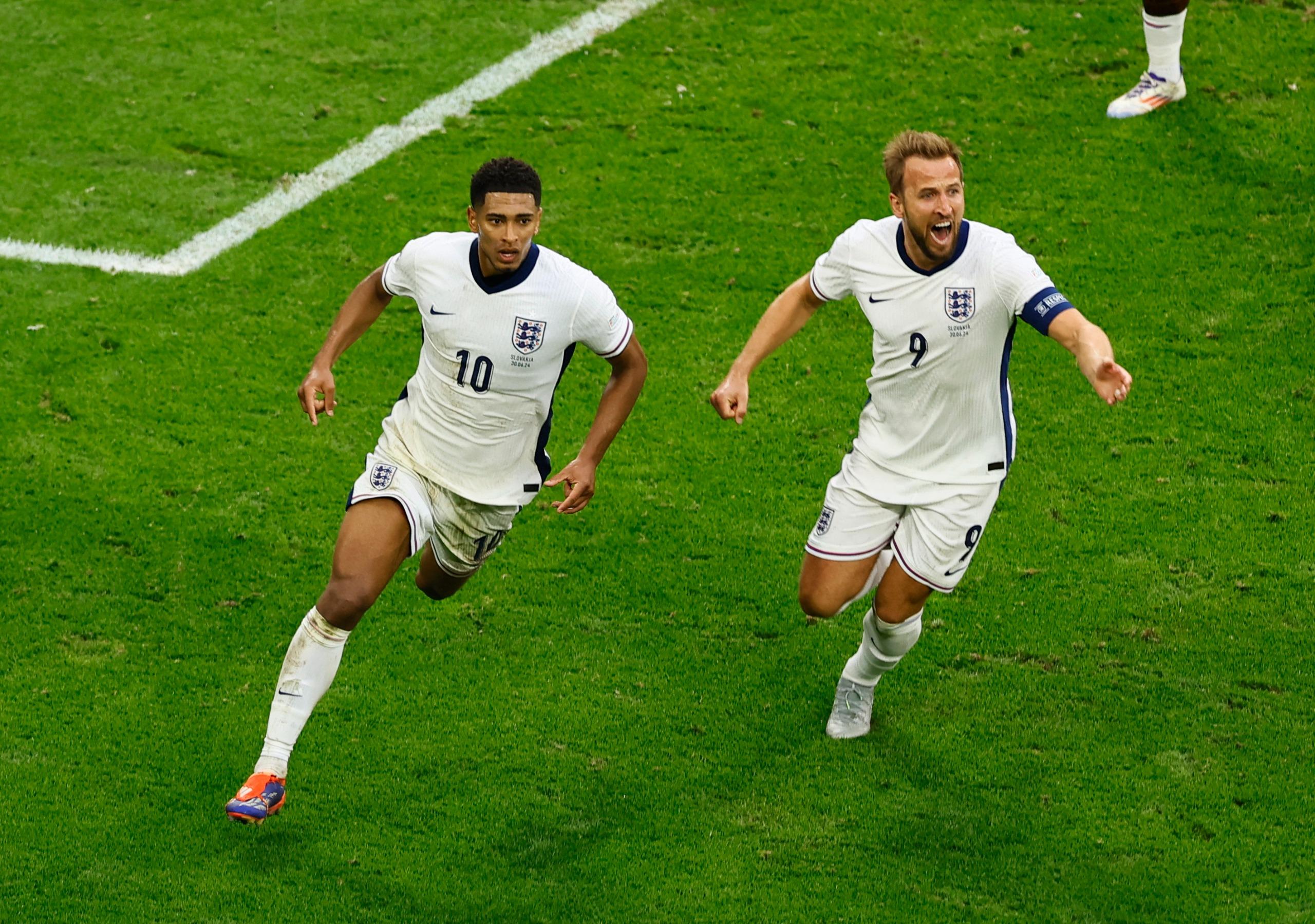 臨完場前最後一擊追平,比寧咸一球值千金。(路透社)