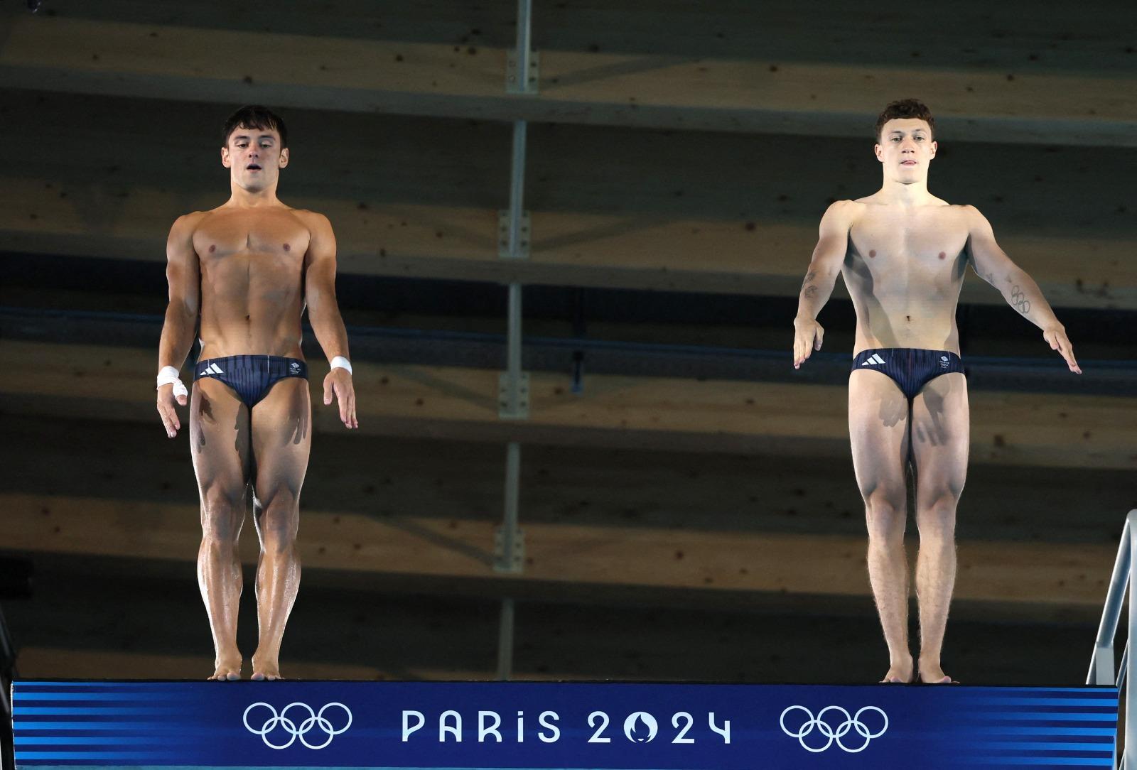 戴利夥拍諾亞威廉斯摘銀。(路透社)