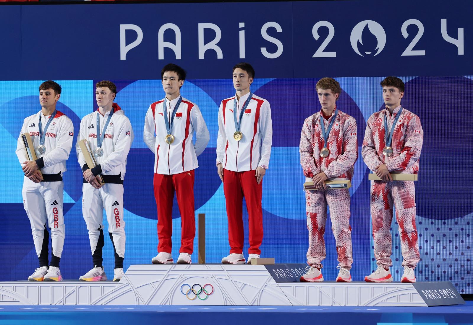 男子雙人10米高台跳水一眾獎牌得主。(路透社)