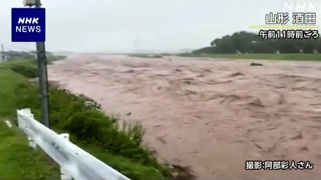 山形縣酒田市水勢汹汹。(互聯網)